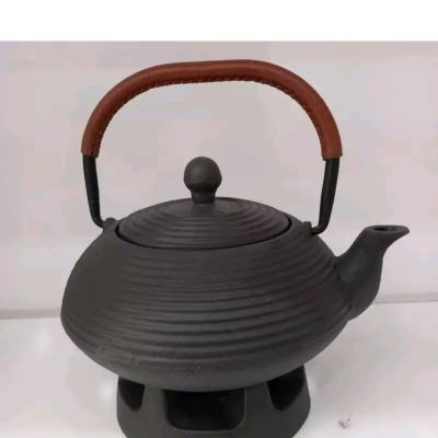 قوری چدن وارمر دار